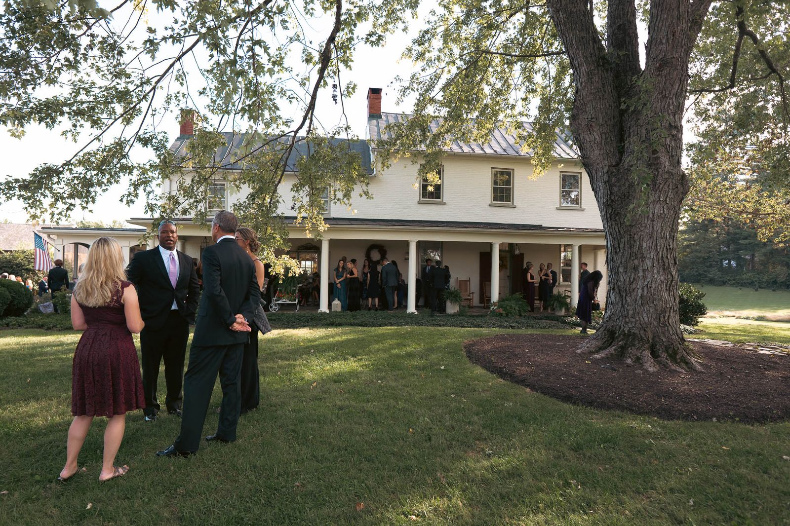 Guests arriving on the lawn before the ceremony — Sylvanside Farm wedding in Purcellville, Virginia