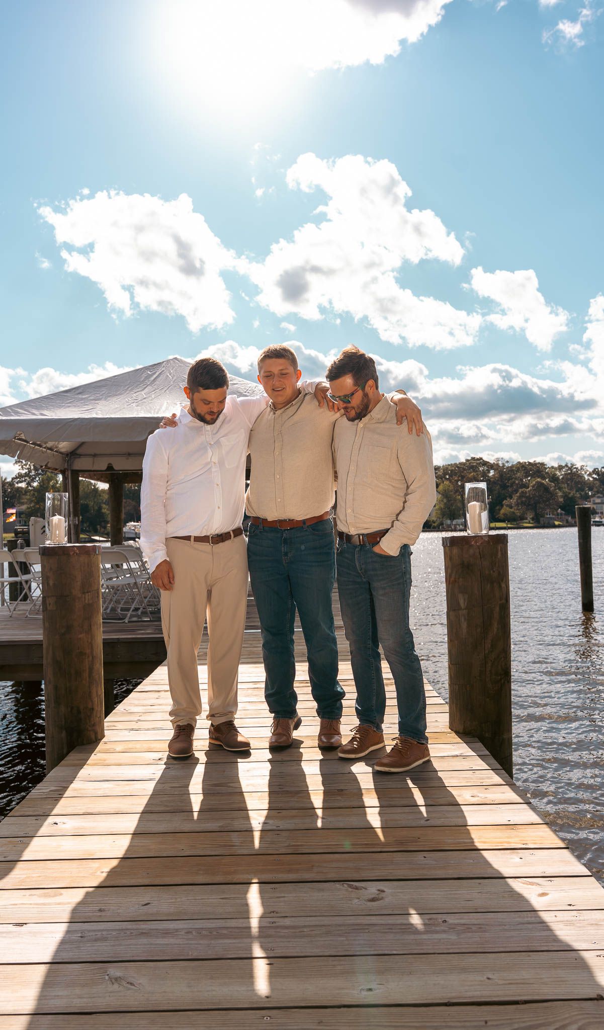 Groom and groomsmen on the dock before the ceremony — backyard wedding in Annapolis, Maryland