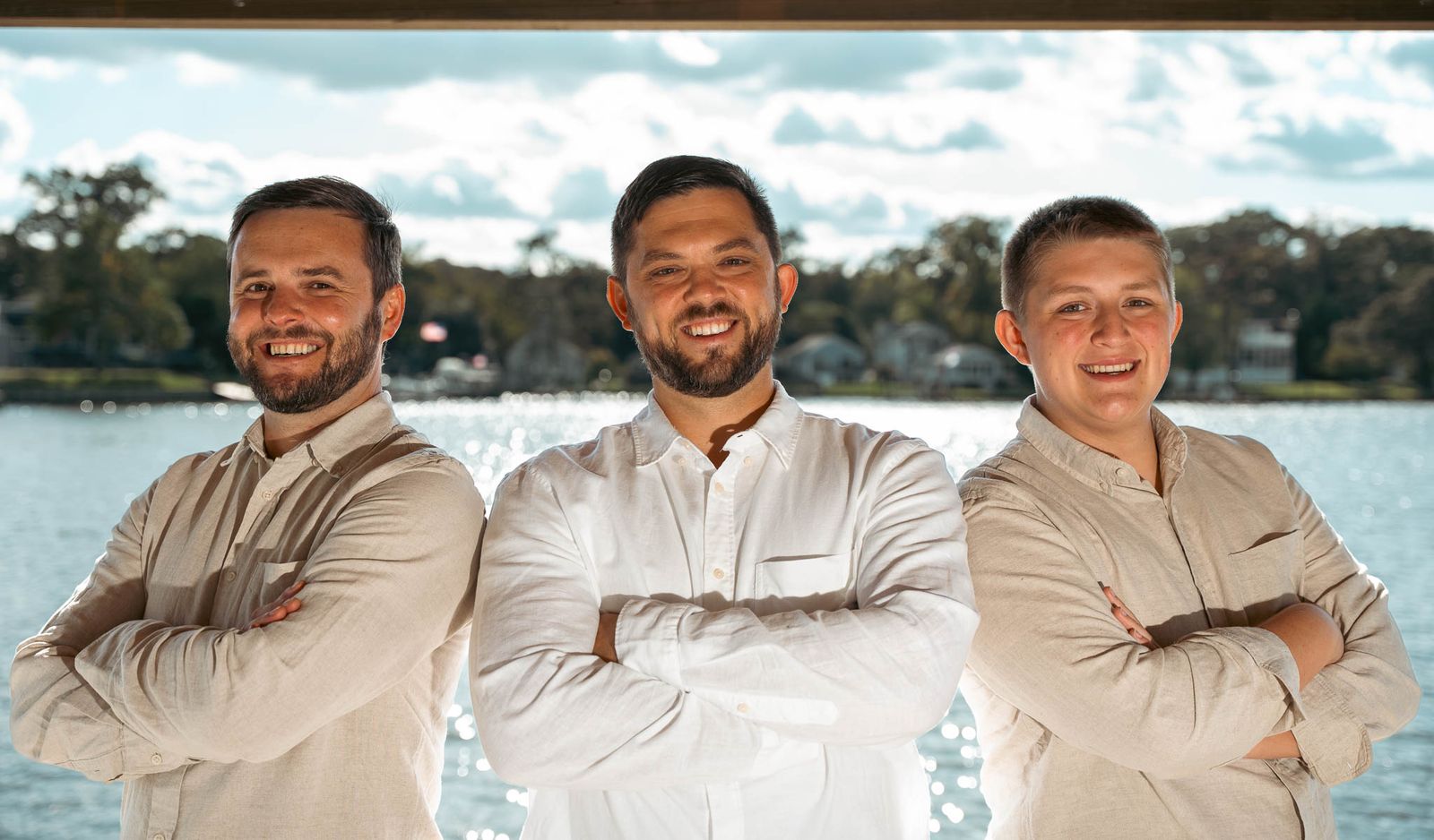 Groom and groomsmen on the dock before the ceremony — backyard wedding in Annapolis, Maryland