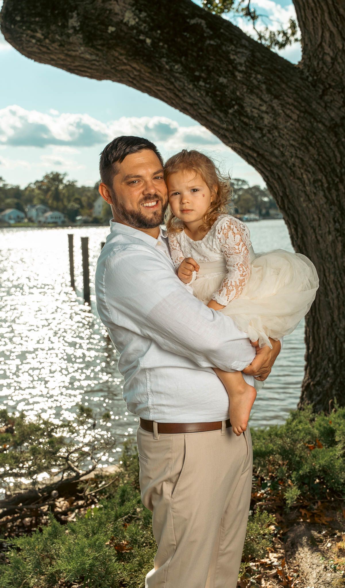 Family portrait by the water before the ceremony — backyard wedding in Annapolis, Maryland