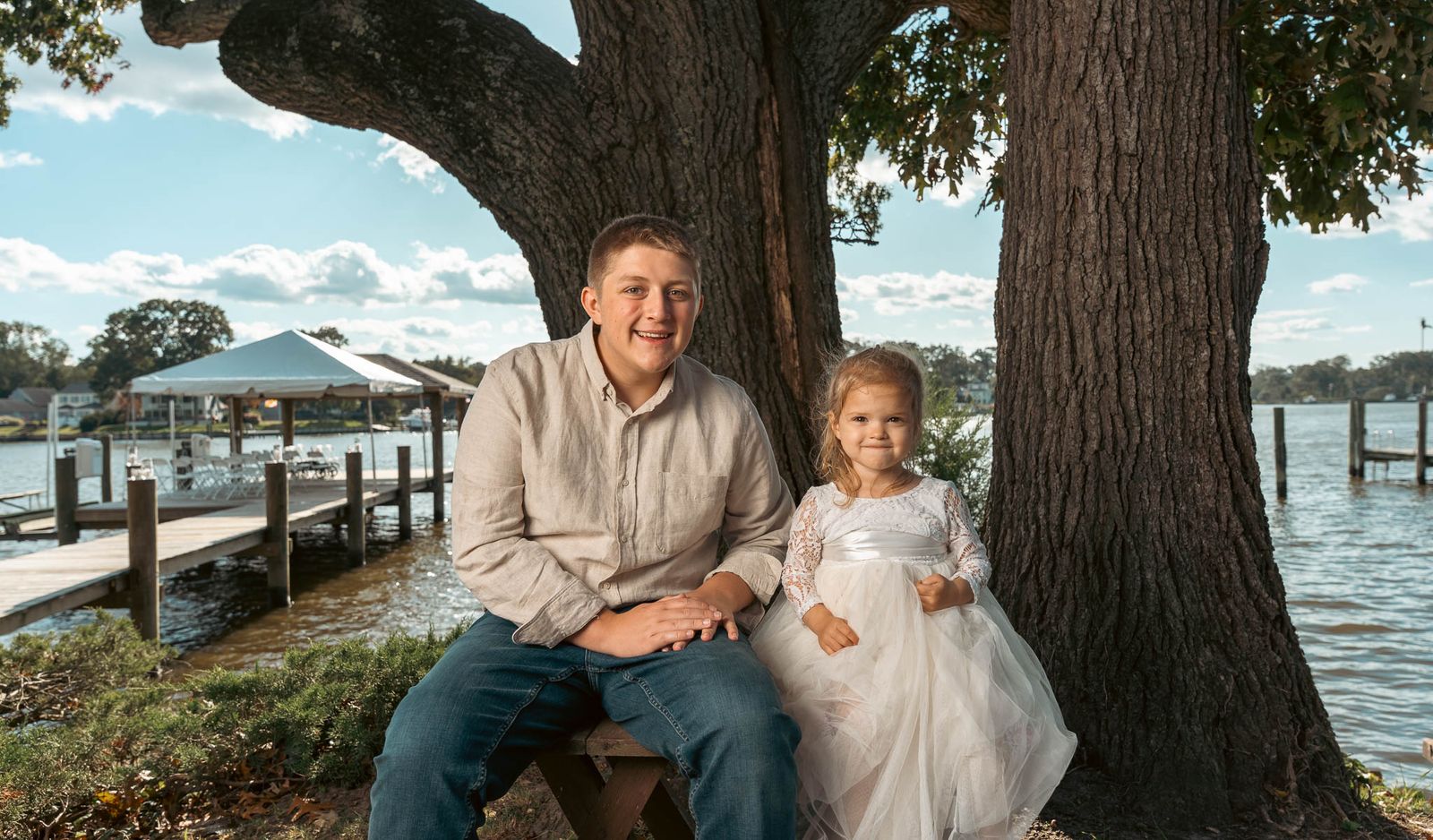 Family portrait by the water before the ceremony — backyard wedding in Annapolis, Maryland