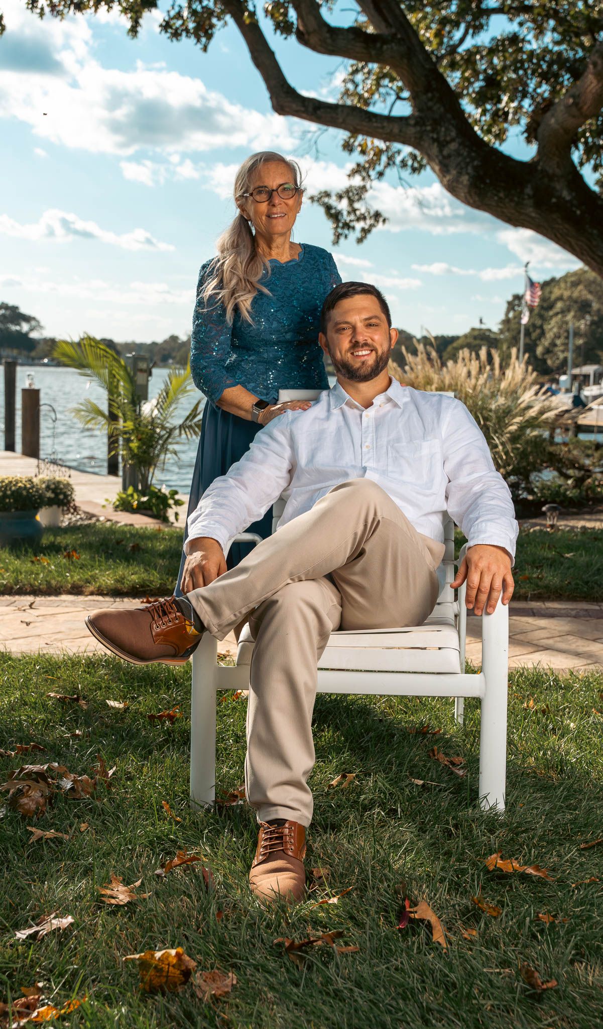 Family portrait by the water before the ceremony — backyard wedding in Annapolis, Maryland